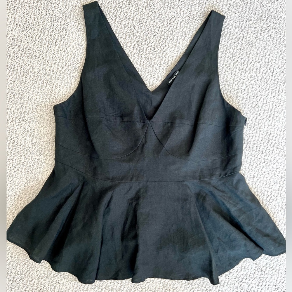 Adorable black peplum top! NWT 🖤